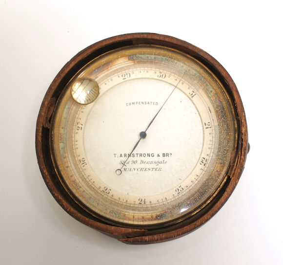 Bonhams : A compensated travelling aneroid barometer