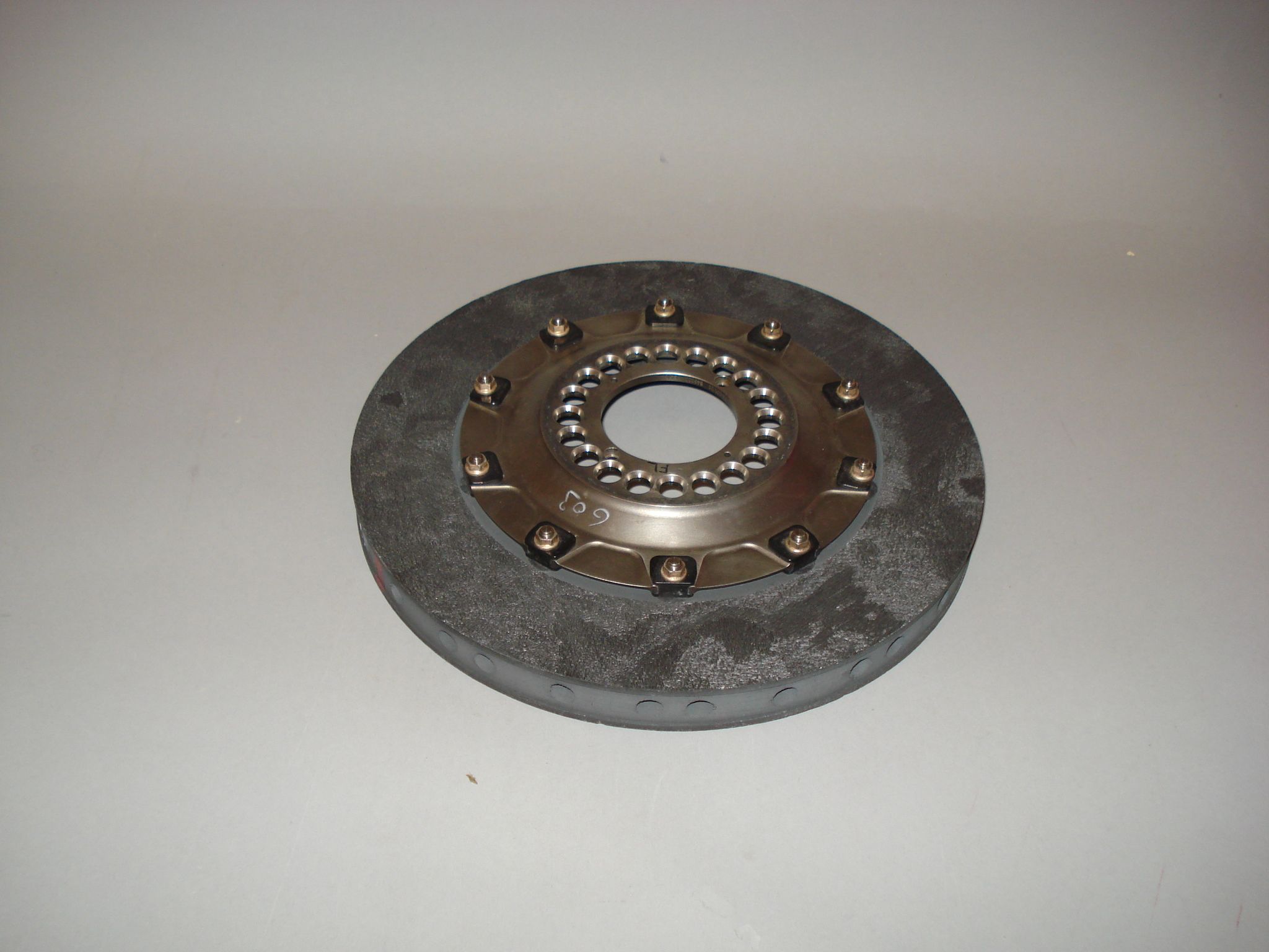 Bonhams Cars : A brake disc and disc bell assembly from a 2005 Honda,