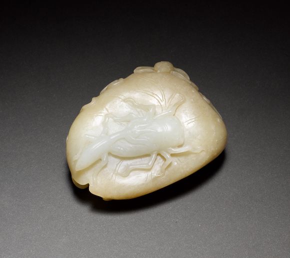 Bonhams : A mottled grey-green and celadon jade designed as two insects ...