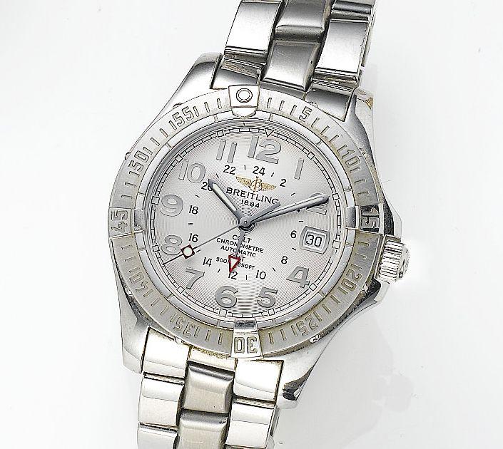 Breitling. A stainless steel automatic chronograph calendar bracelet watch...
