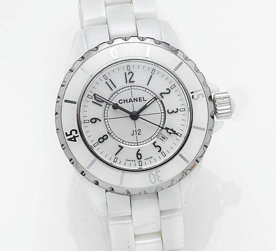 Bonhams : Chanel. A lady's mid-sized white ceramic quartz calendar bracelet  watch together with spare links, presentation box and papersRef HO968,  Serial No. DH81901, Sold in Chanel, New Bond Street, 4th March