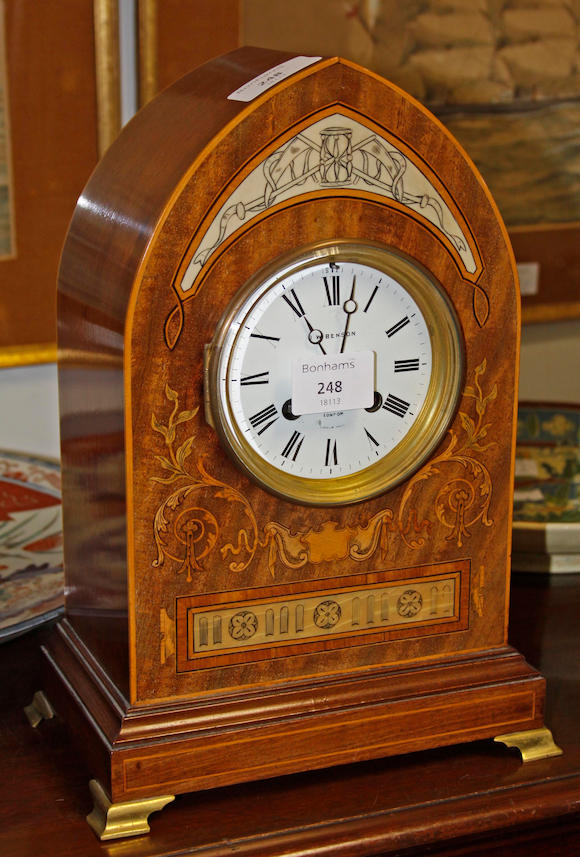 Bonhams : A late Victorian inlaid mahogany lancet top mantle clock, the ...