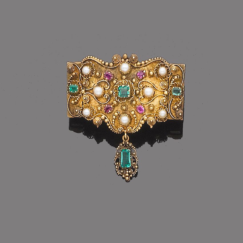 An emerald, ruby and half-pearl brooch,