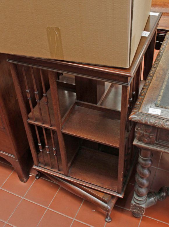 Bonhams An Edwardian mahogany revolving square bookcase,