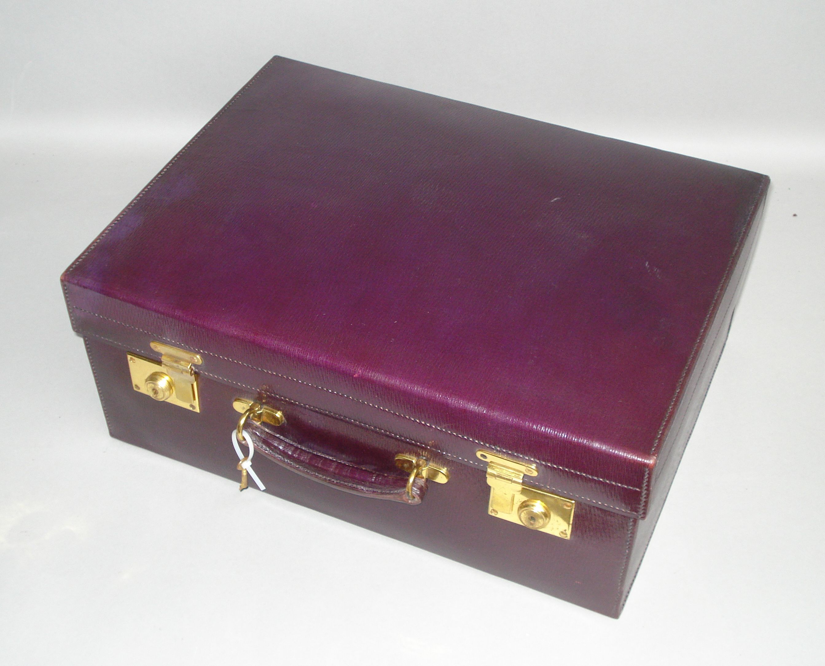 Bonhams Cars A good leather travelling case,