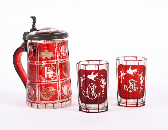 Bonhams : A Bohemian engraved ruby-flashed tankard and two beakers ...