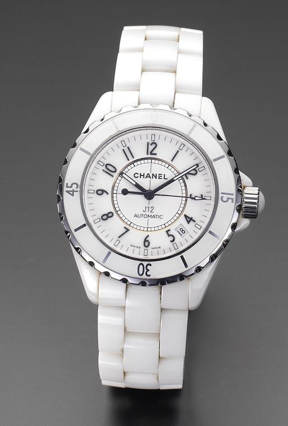Bonhams : Chanel. An white ceramic automatic calendar bracelet watch  together with fitted box and papersJ12, RefH0970, Serial No NX67112, Sold  3rd of September 2004