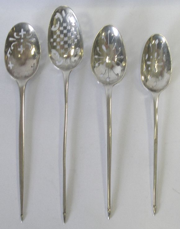 Bonhams Four 18th century silver mote spoons, (4)