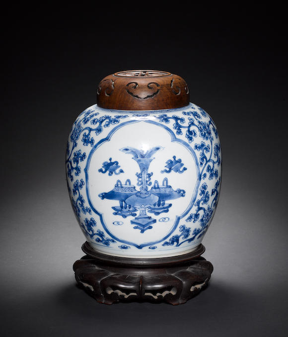 Bonhams A Blue And White Oviform Vase With A Chinese Wood Cover And Stand 