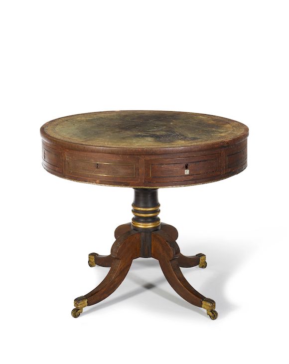 Bonhams A small Regency rosewood and brass inlaid drum top table