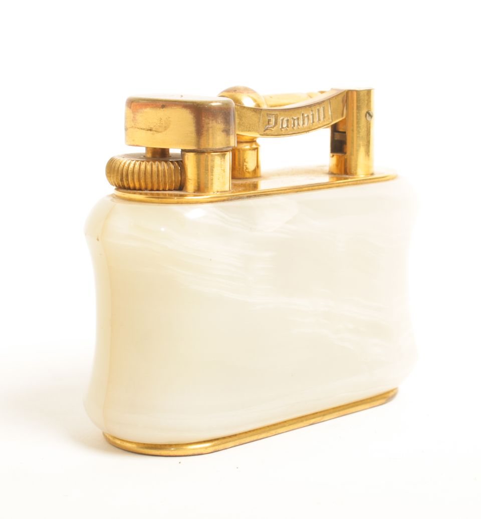 Bonhams A Dunhill onyx and giltmetal table lighter