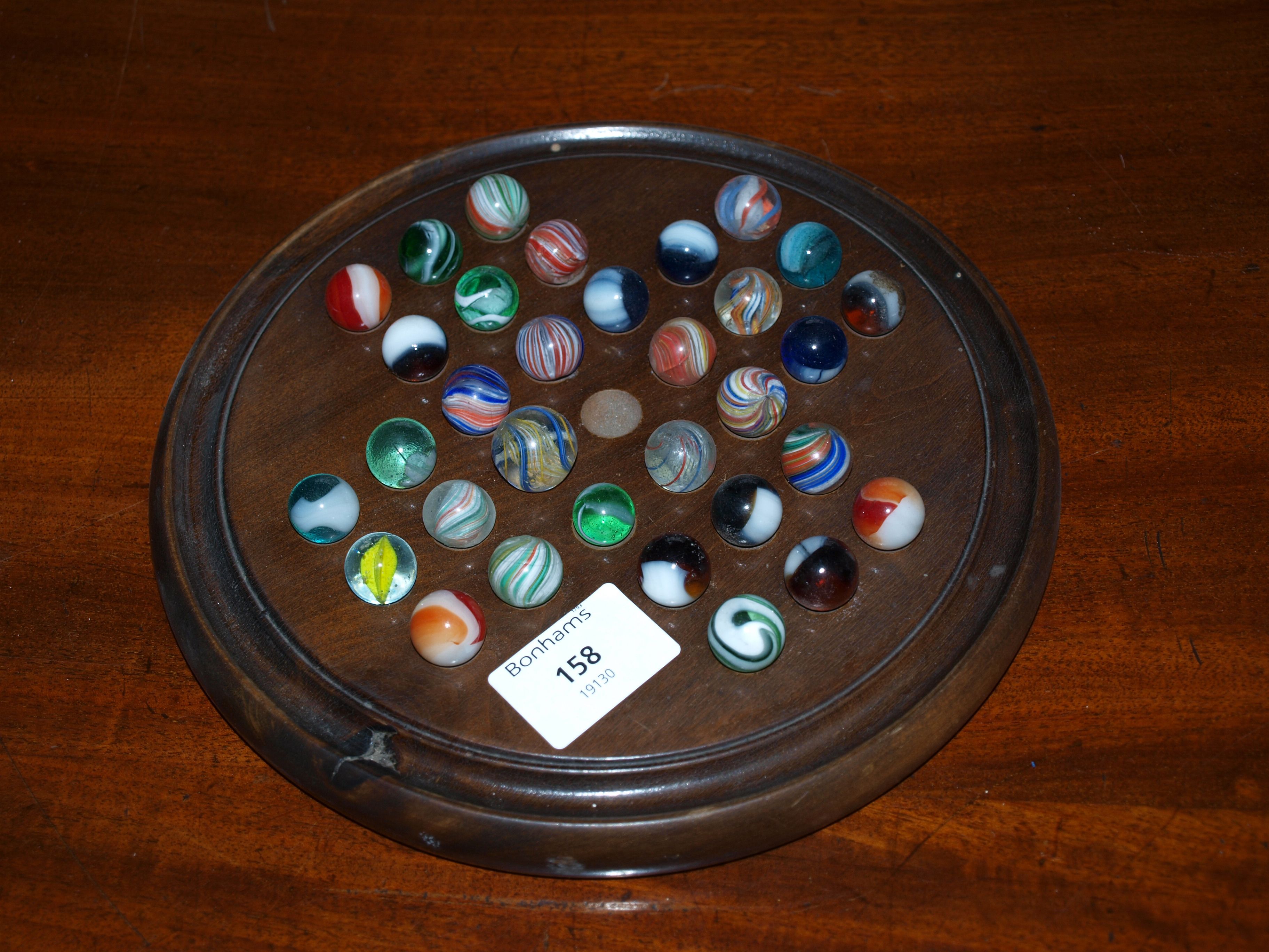 A treen solitaire board