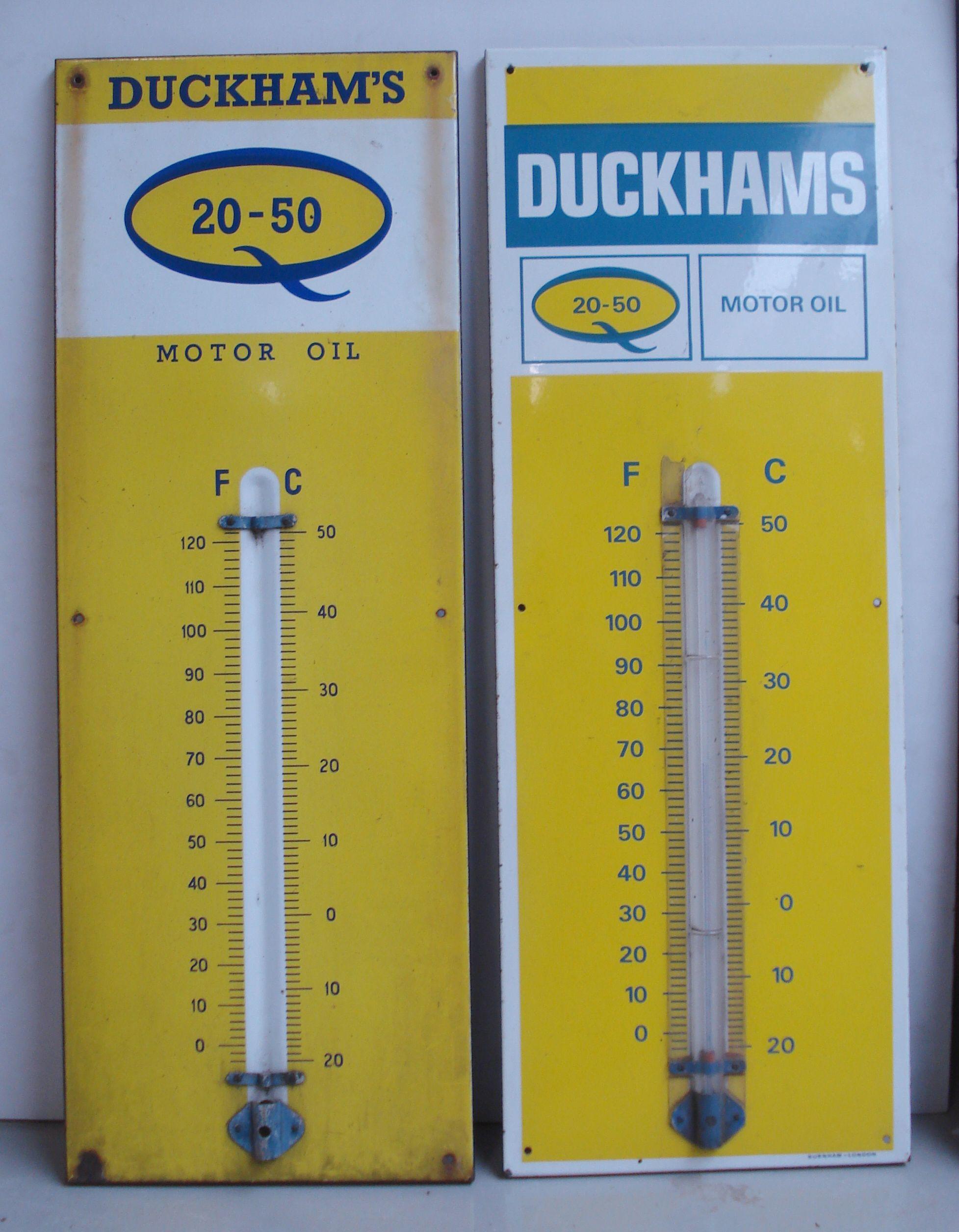 Bonhams Cars : Two Duckham's Oil enamel garage thermometers,