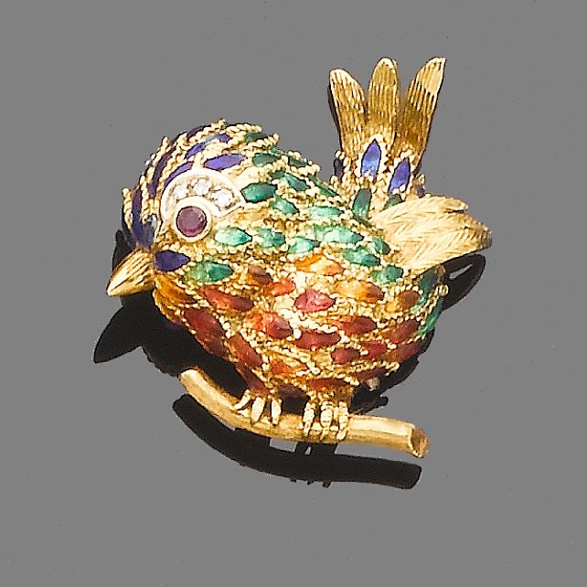 A ruby, enamel and diamond brooch