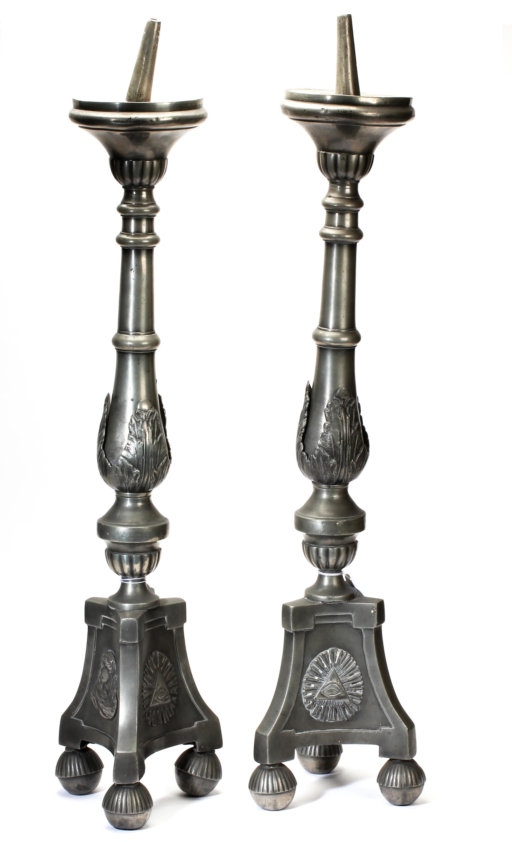 Bonhams : A pair of 17th century brass alloy pricket candlesticks