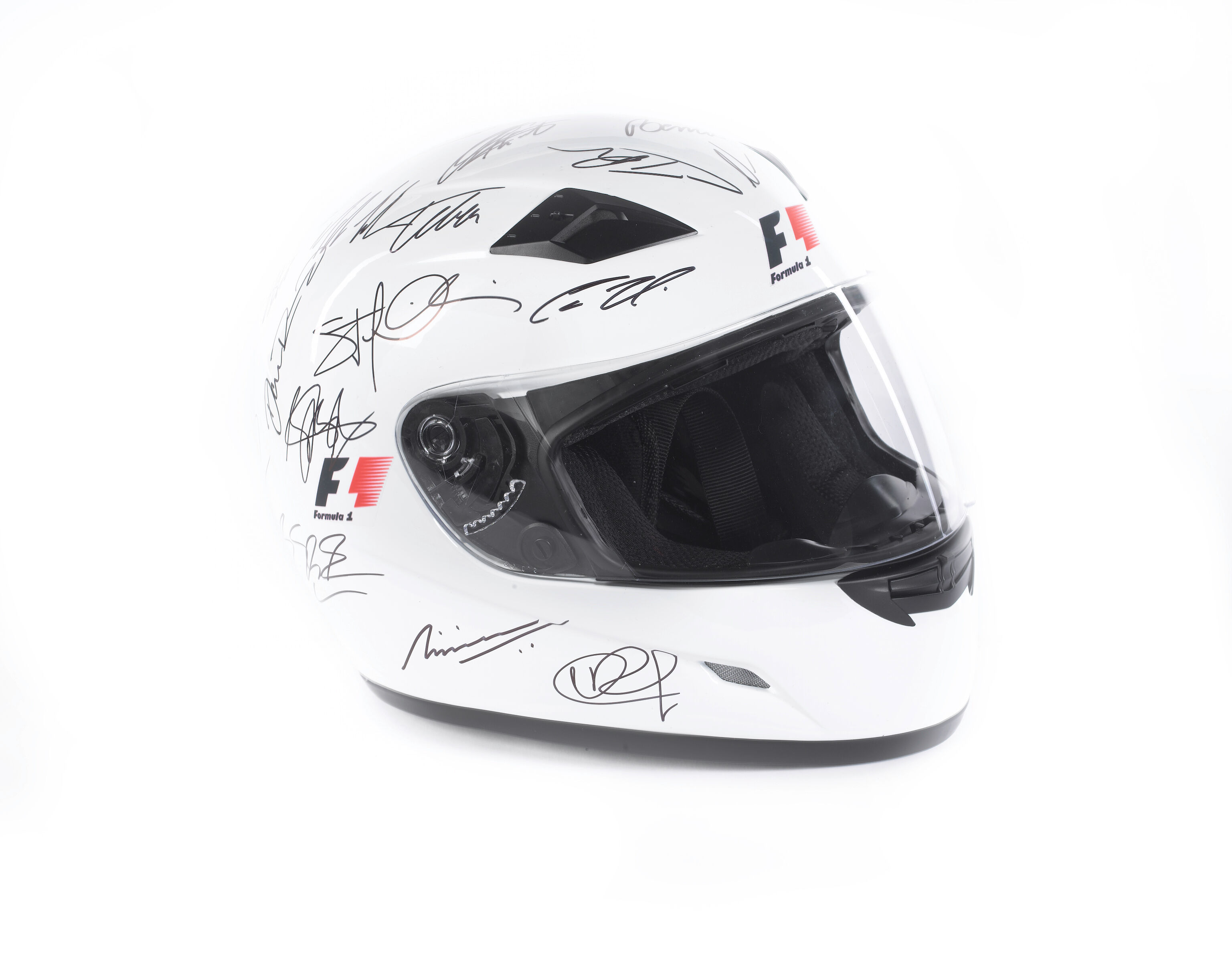 Bonhams Cars : A rare 2010 season signed F1 helmet with full compliment ...