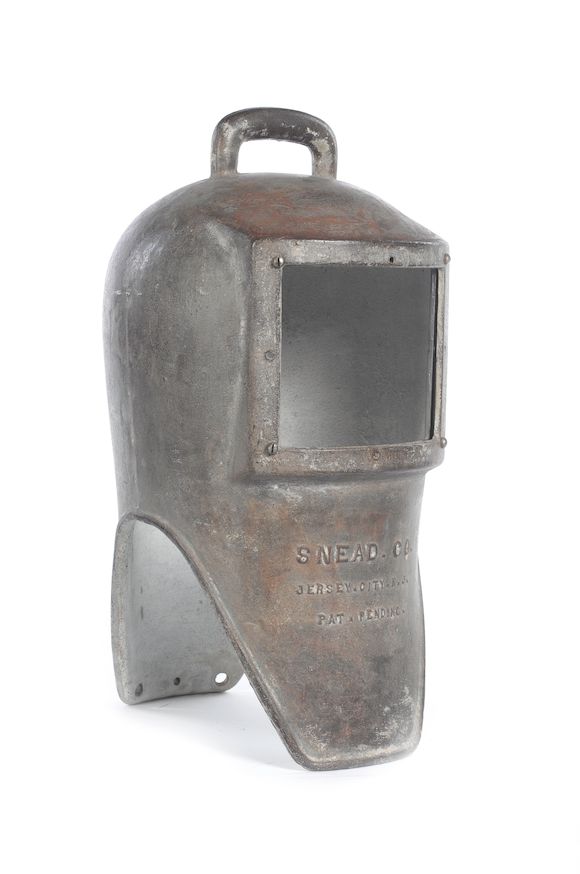 Bonhams A cast iron shallow water Diving Helmet, 22in (57cm) high.