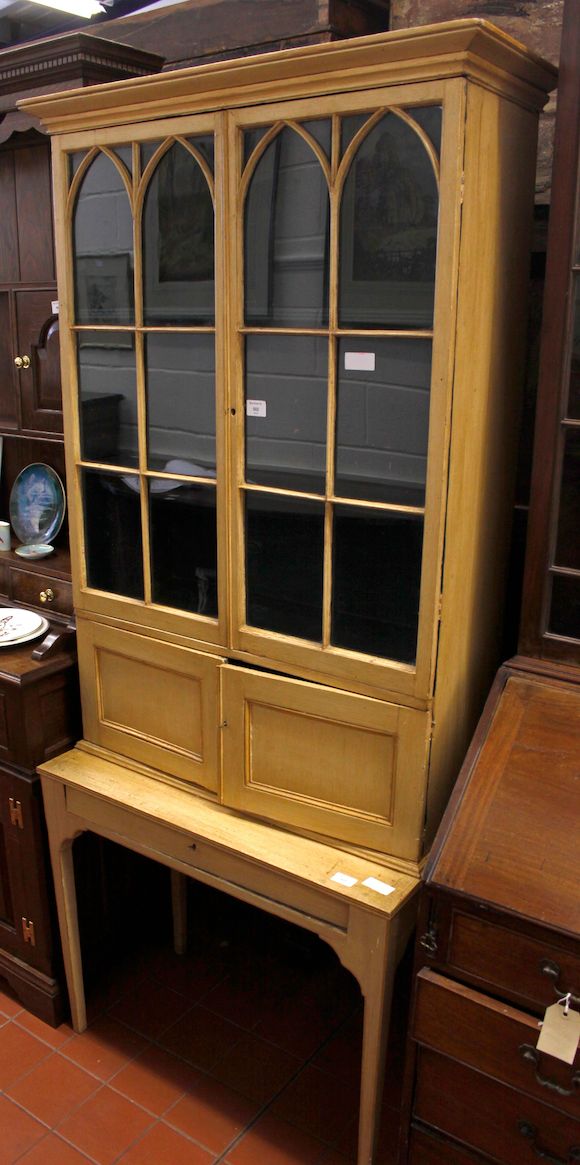 Bonhams A Regency cream painted bookcase