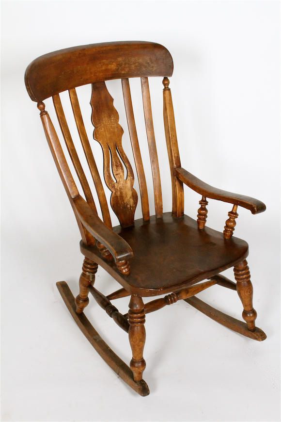 Bonhams : A beech and elm lath and splat back rocking chair, circa 1900