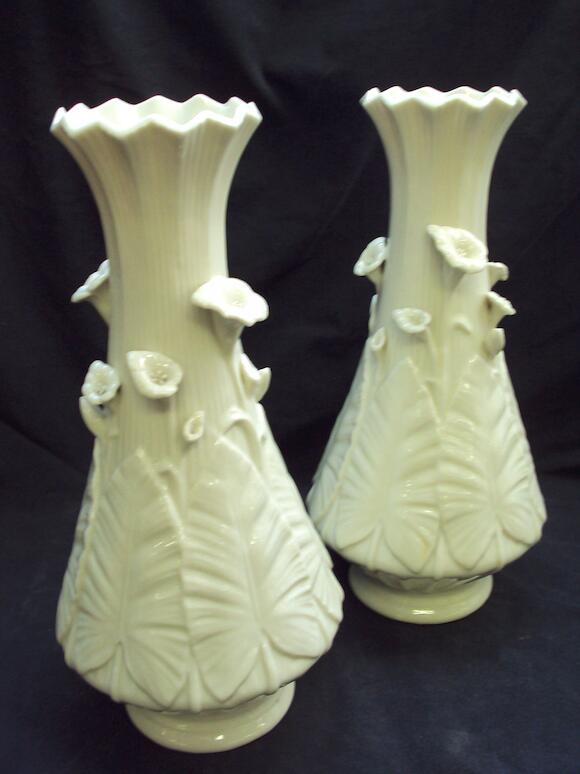 Bonhams A pair of Belleek vases