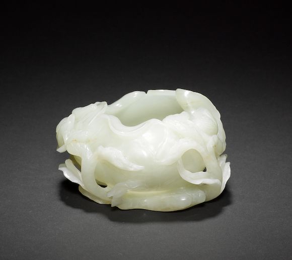 Bonhams A green jade water pot designed as an open lotus flower