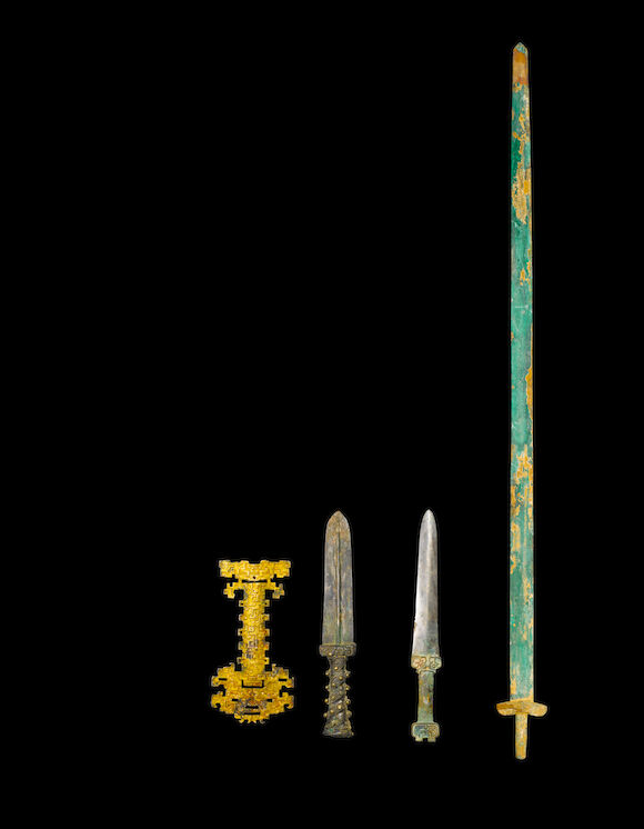 Bonhams : Three jian and a pommel Qin dynasty