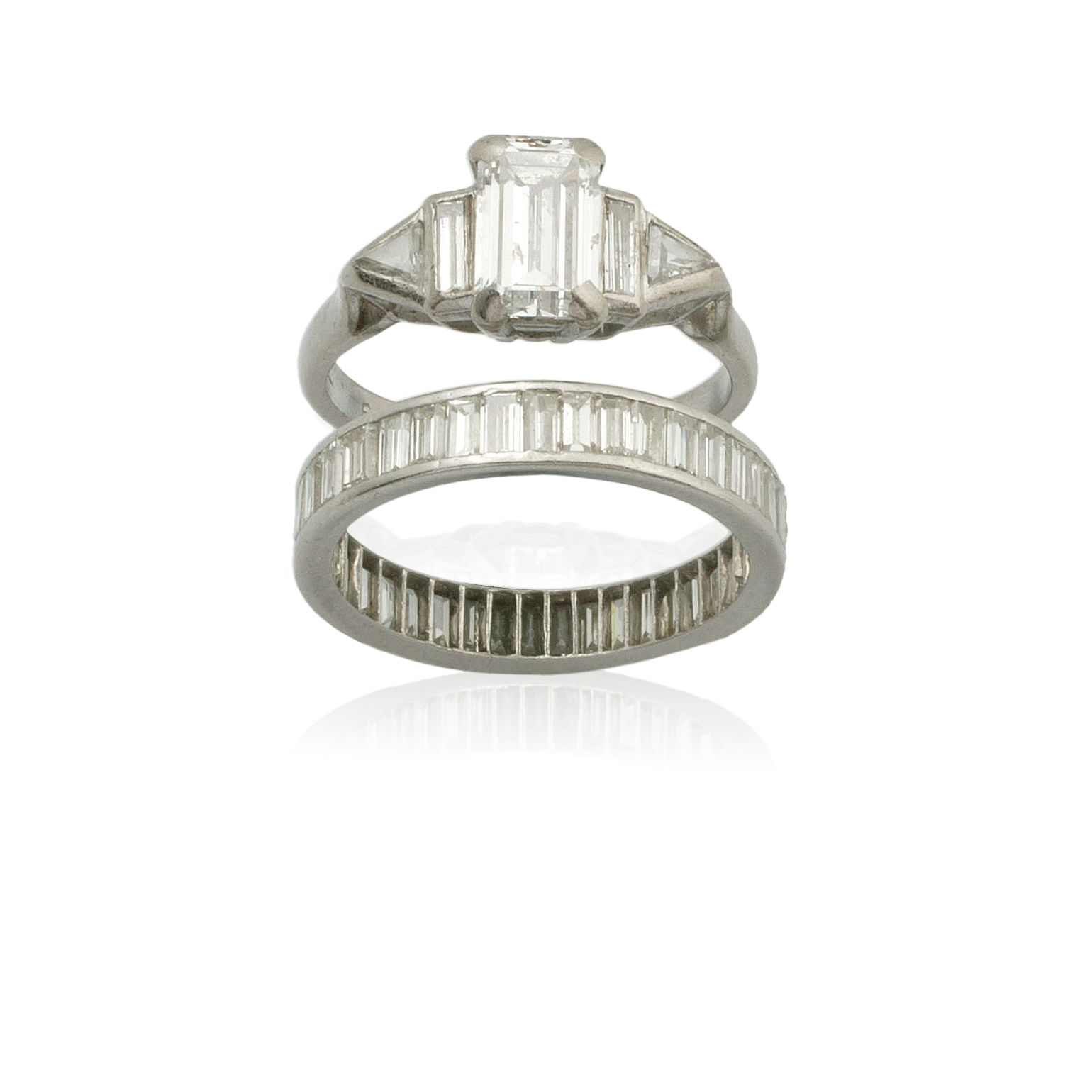 An emerald cut diamond ring