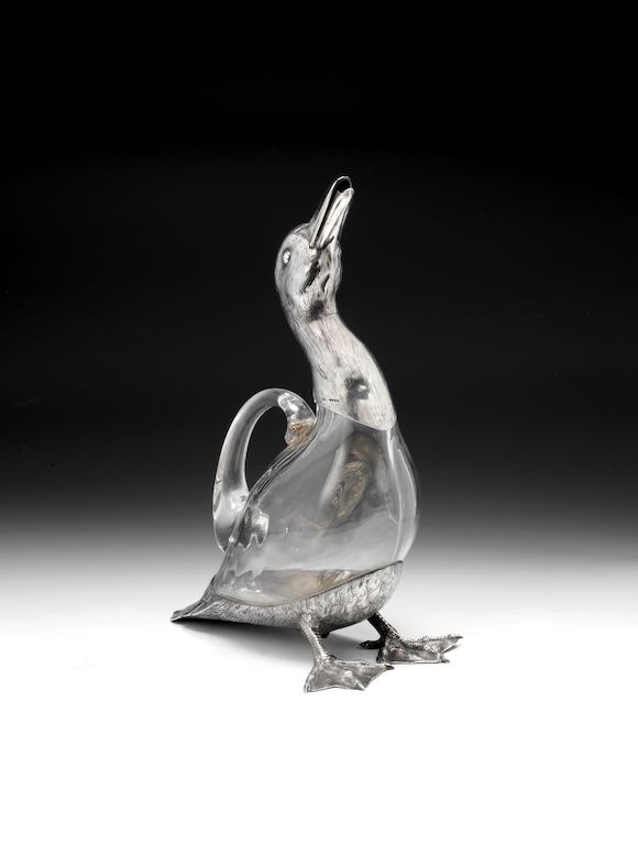 Bonhams A late Victorian silver and clear glass novelty 'duck' claret
