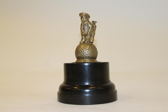 Bonhams : A 1931 Dunlop golfers mascot