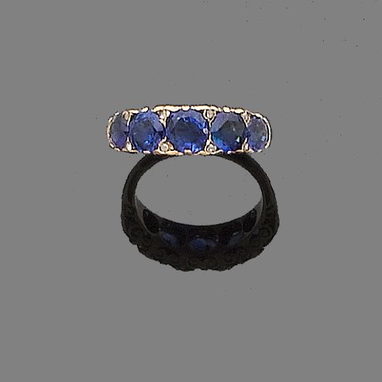 A sapphire five-stone ring
