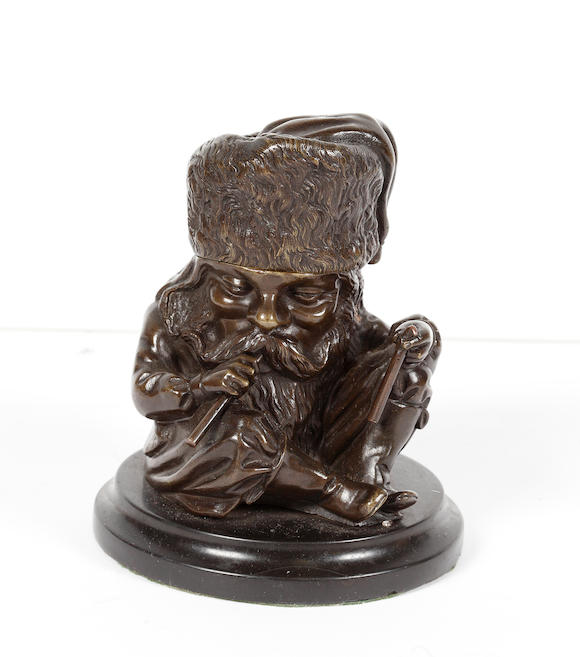 Bonhams : A bronze inkwell modelled as a seated dwarf