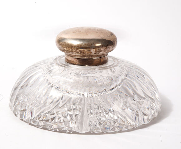 Bonhams : A large glass library inkwell with silver mount and cover,