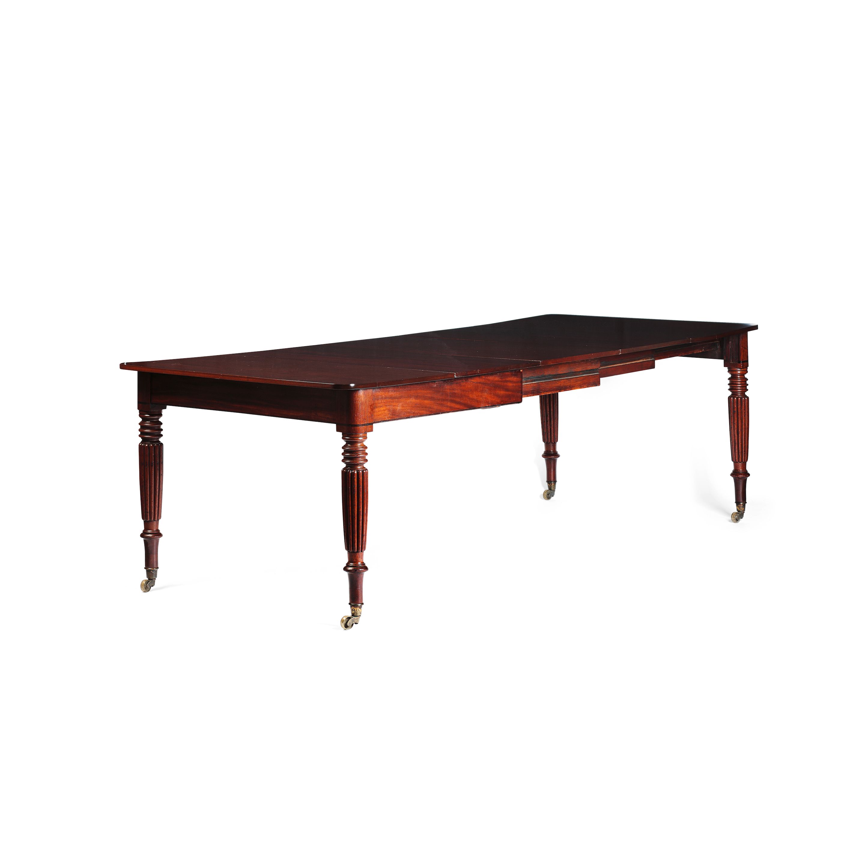 A Regency mahogany dining table