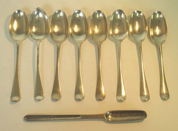 Bonhams : Eight silver bottom marked dessert spoons, marks distorted, (9)
