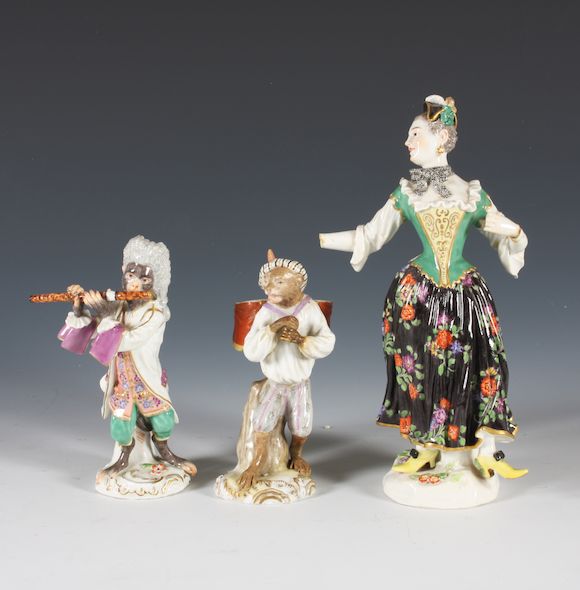 Bonhams Three Meissen monkey band figures and a figure of a lady
