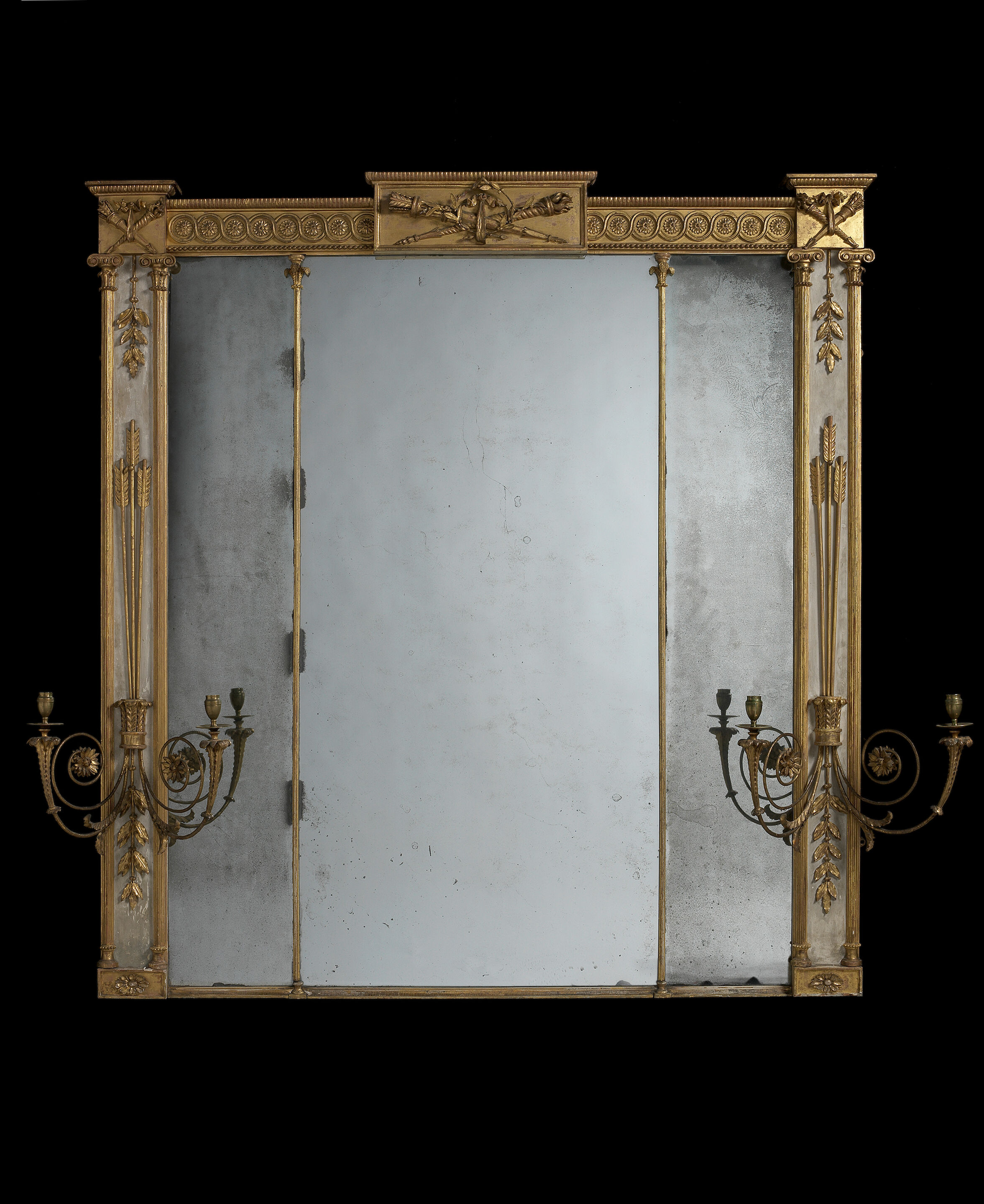 A George III carved giltwood and cream painted overmantel mirror