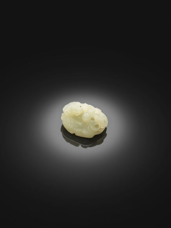 Bonhams : A small white jade 'ram and bat' pebble 18th century