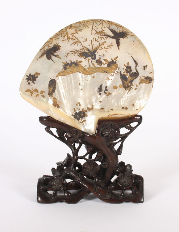 Bonhams : A Chinese lacquered abalone shell on a hardwood stand