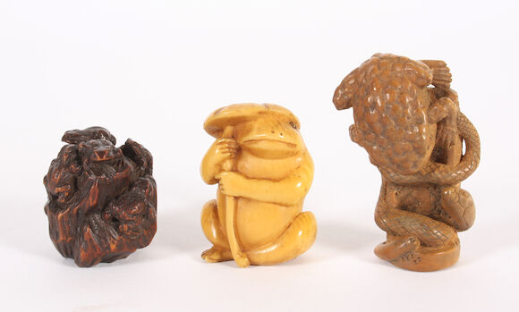 Bonhams : A Japanese carved ivory netsuke and two hardwood examples ...