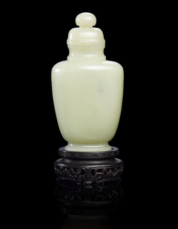 Bonhams A pale green jade vase and cover Qing dynasty
