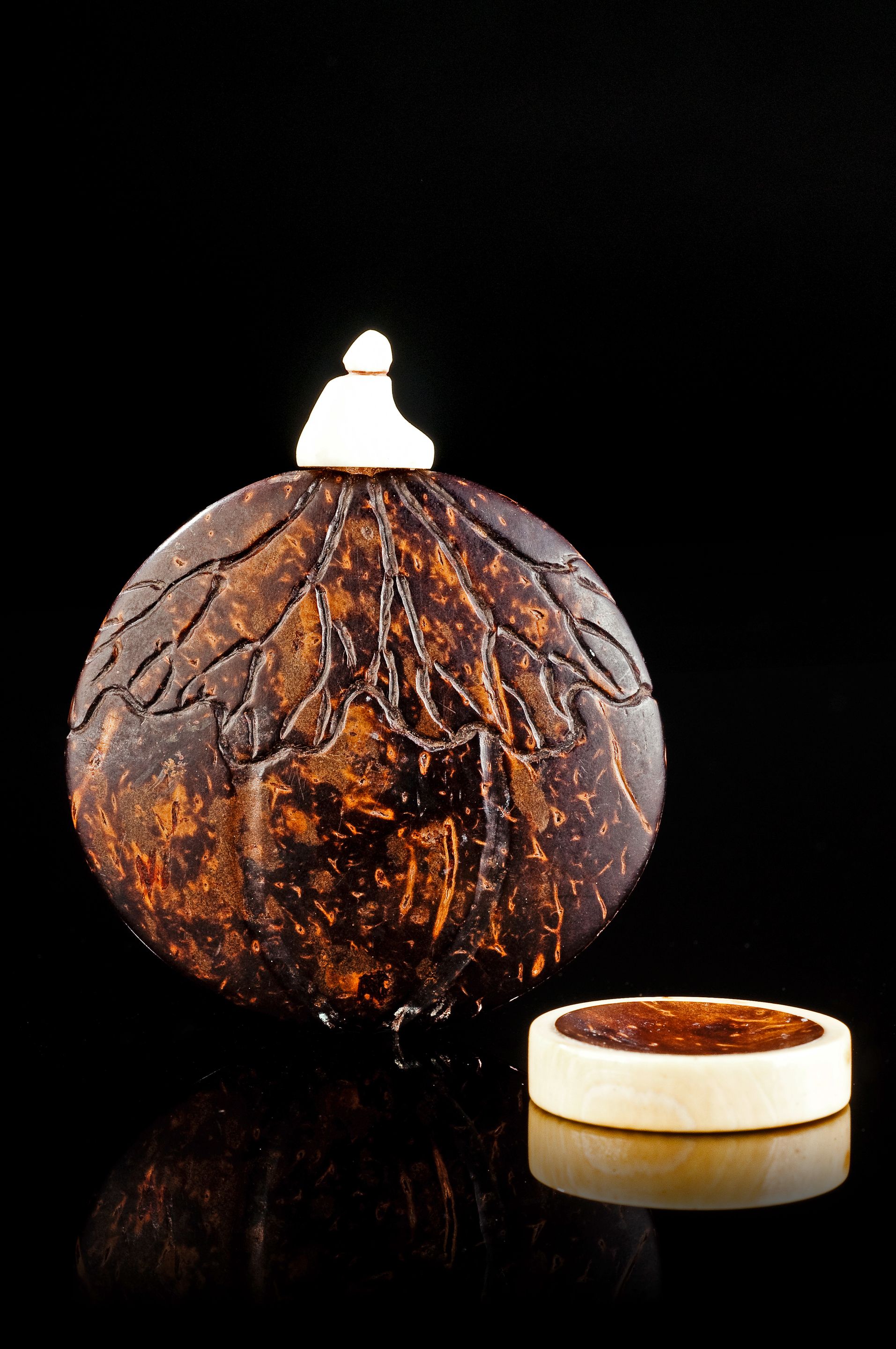 Bonhams A carved coconut snuff bottle and snuff dish Mid Qing dynasty