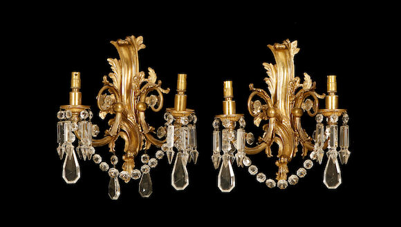 Bonhams : A pair of early 20th century gilt metal and cut glass wall lights