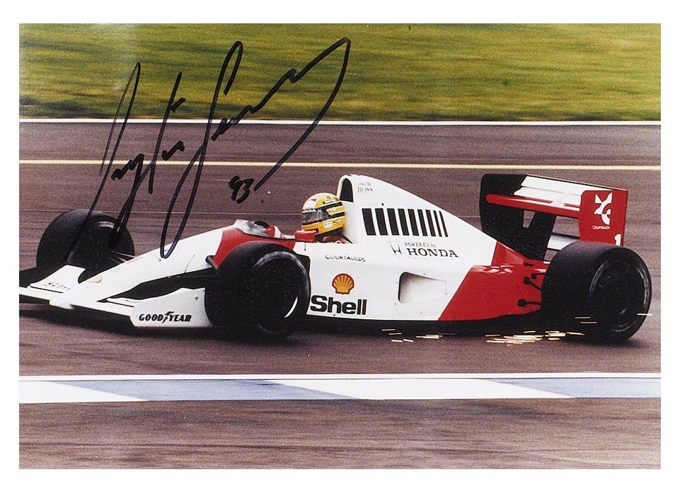 Bonhams Cars : A signed Ayrton Senna colour photograph,