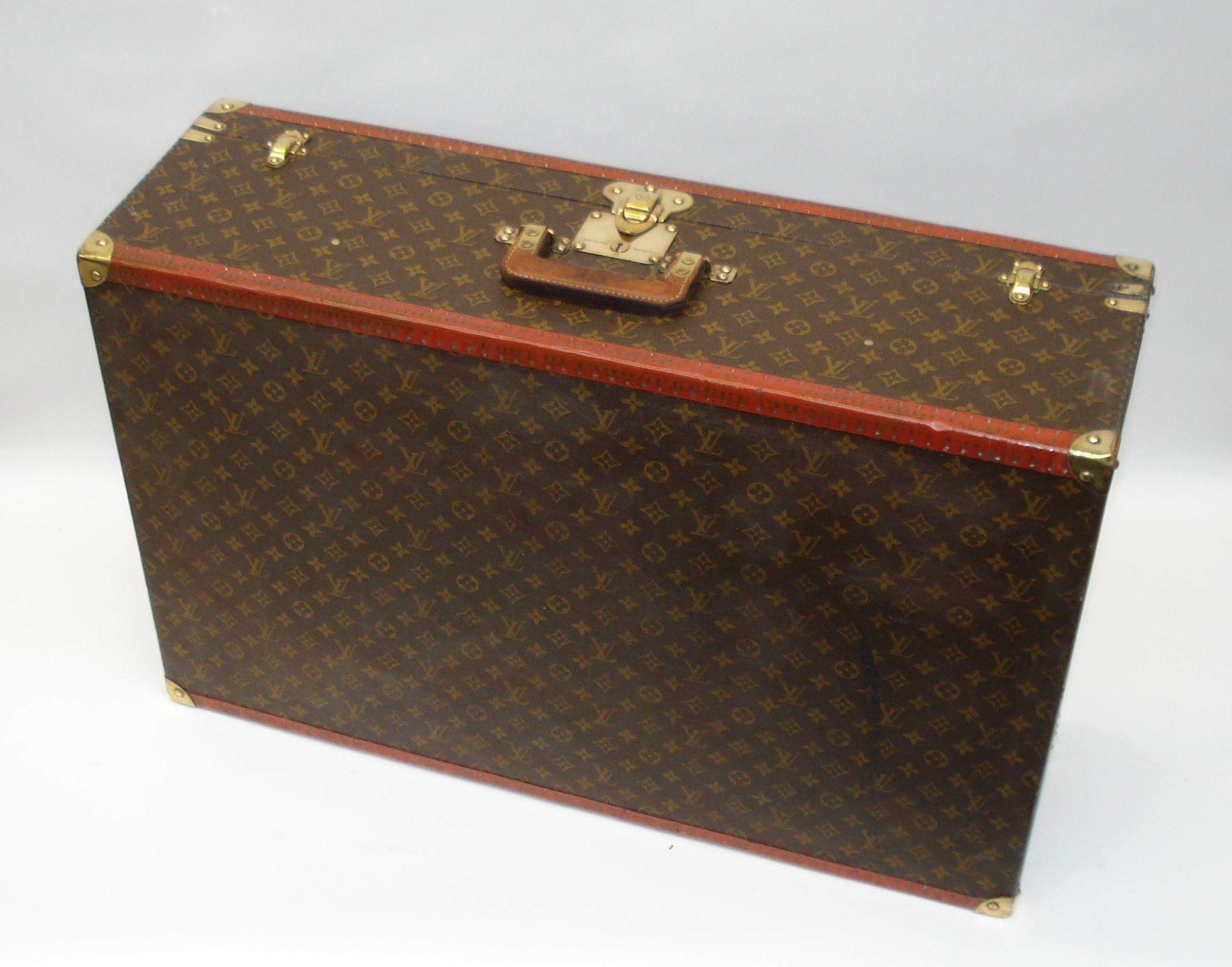 At Auction: Louis Vuitton, LOUIS VUITTON Monogram LV Pattern Luggage