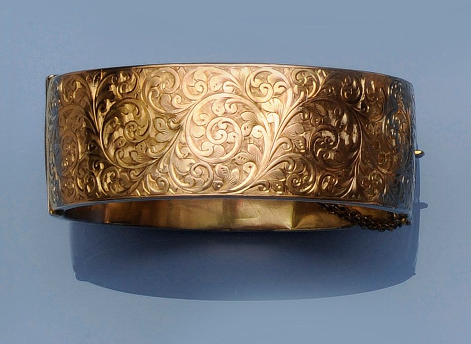 A Victorian broad hinged bangle