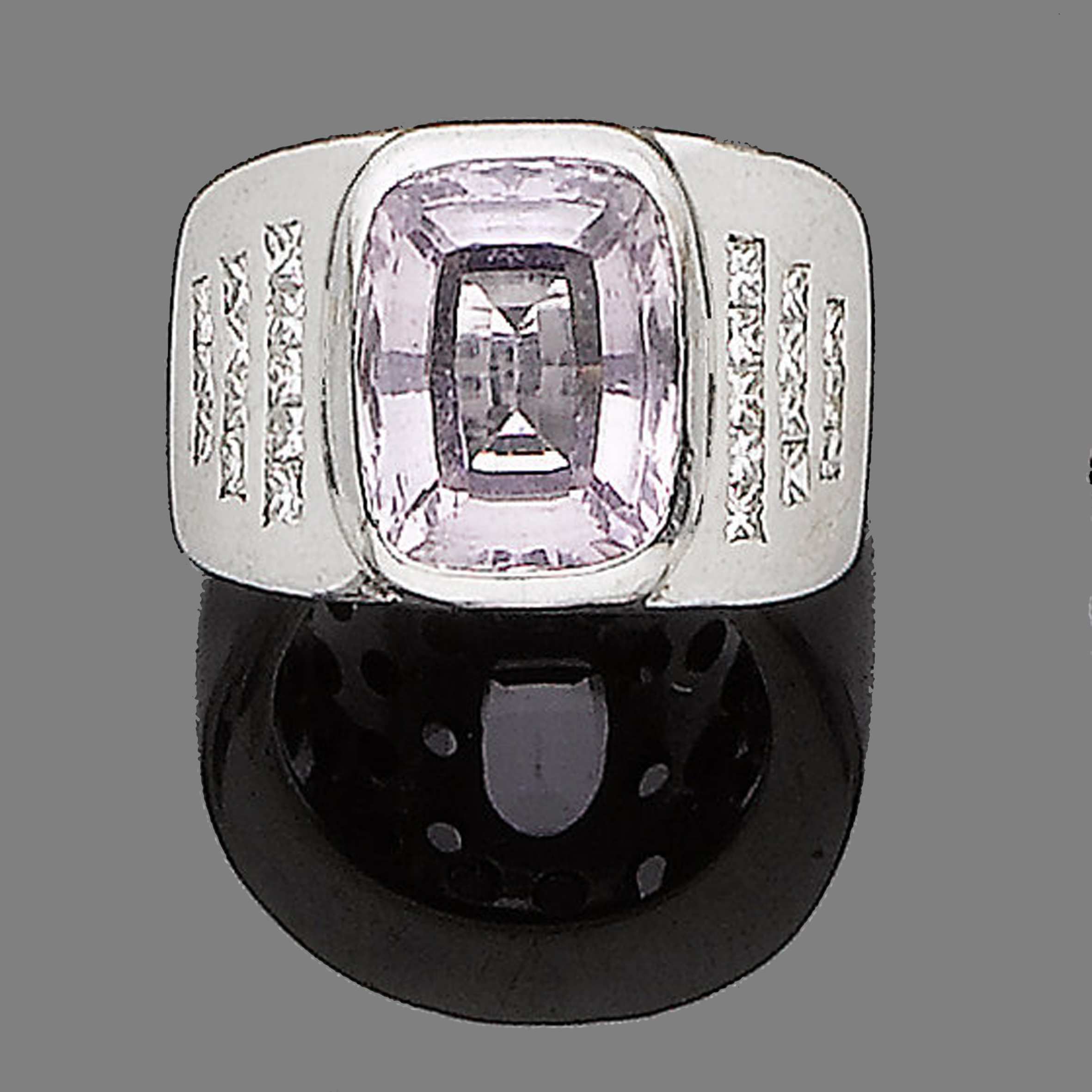 A kunzite and diamond ring