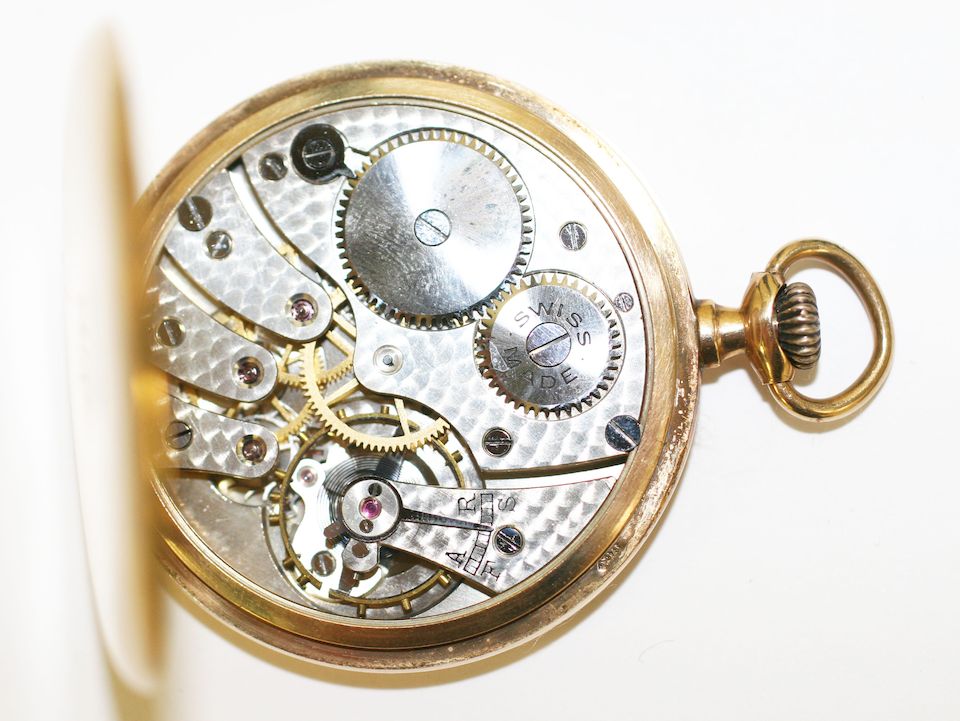 Bonhams Rolex A 9ct gold open face pocket watch