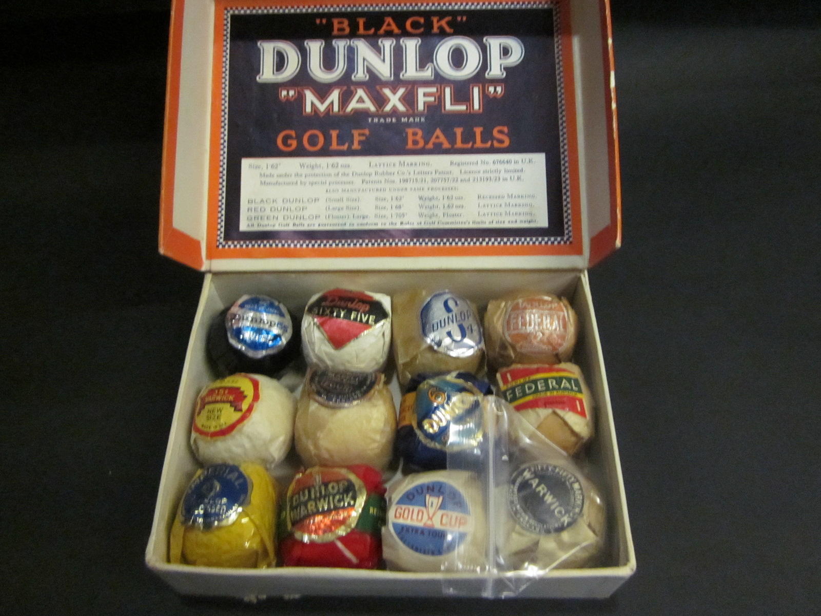 Lot Detail - Dunlop 65 Golf Balls - Four Wrapped and the Box