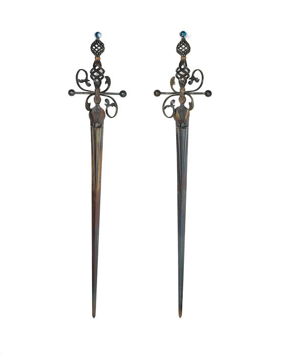 Bonhams Mark BrazierJones Pair of Sword Sconces designed 1987 wrought iron and glass Height