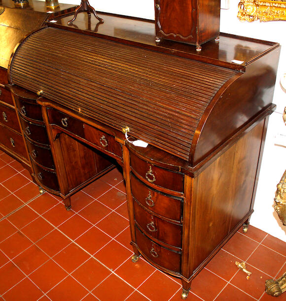Bonhams An early 20th Century mahogany tambour fronted cylinder desk
